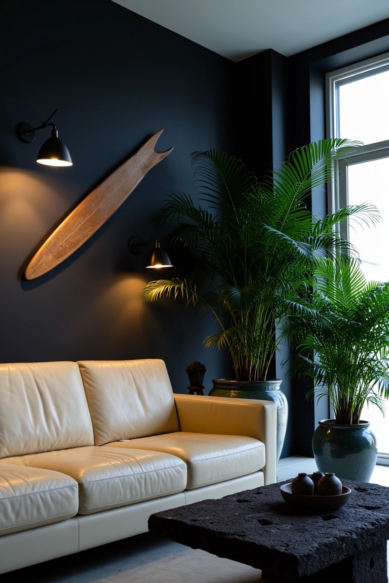 Living room with wooden surfboard mounted on navy wall above beige leather sofa, flanked by potted palms and black coffee table