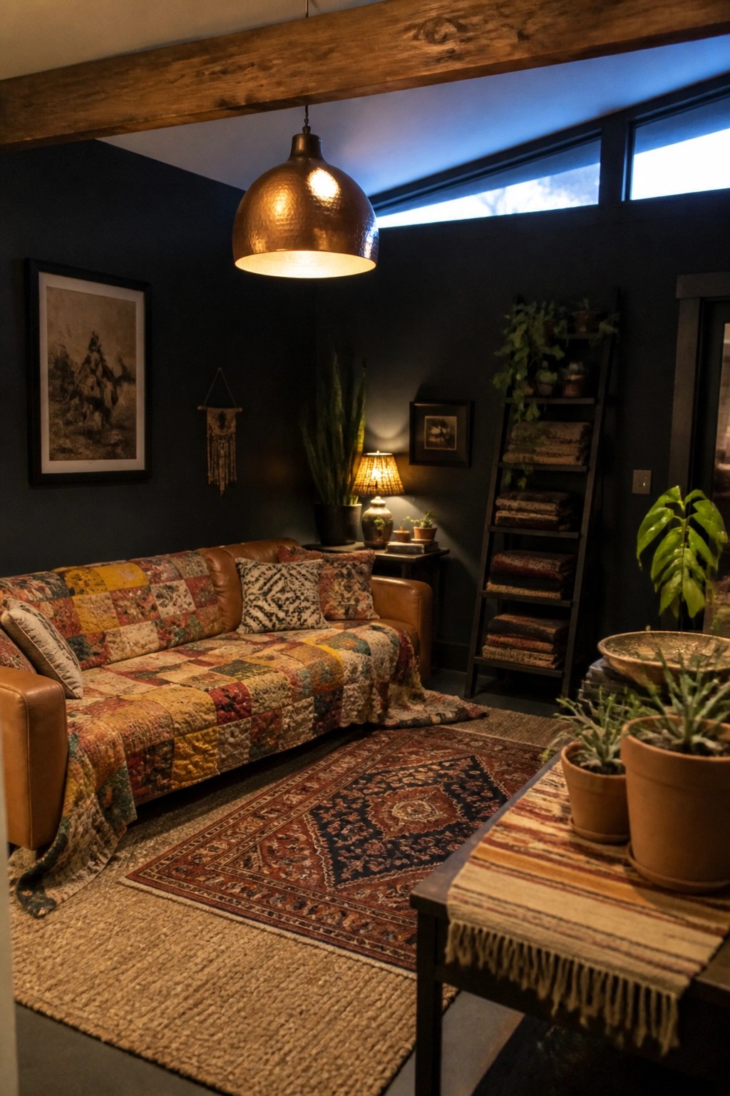 Cozy living room with leather sofa, patchwork quilt, copper pendant light, and patterned rug.